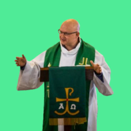 headshot of a male priest